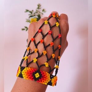 Handcrafted Beaded floral fishnet Bracelet with ring attach, size 10.5 ring 💍